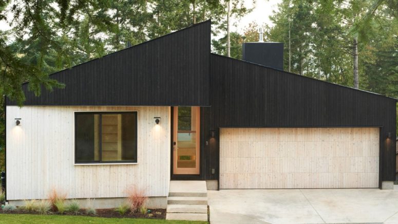 This minimalist home in Washington is covered with two tone wood to make its look contrasting and outstanding from the traditional neighborhood
