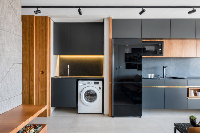 The storage and lights are built-in and the kitchen can be hidden with sliding doors anytime