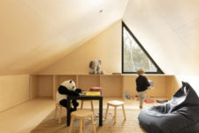 06 The upper, attic space, is given to the kid, it’s a comfortable and cozy playspace with cool furniture