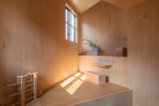 This peaceful corner fully done with plywood is a relaxation oasis for sure