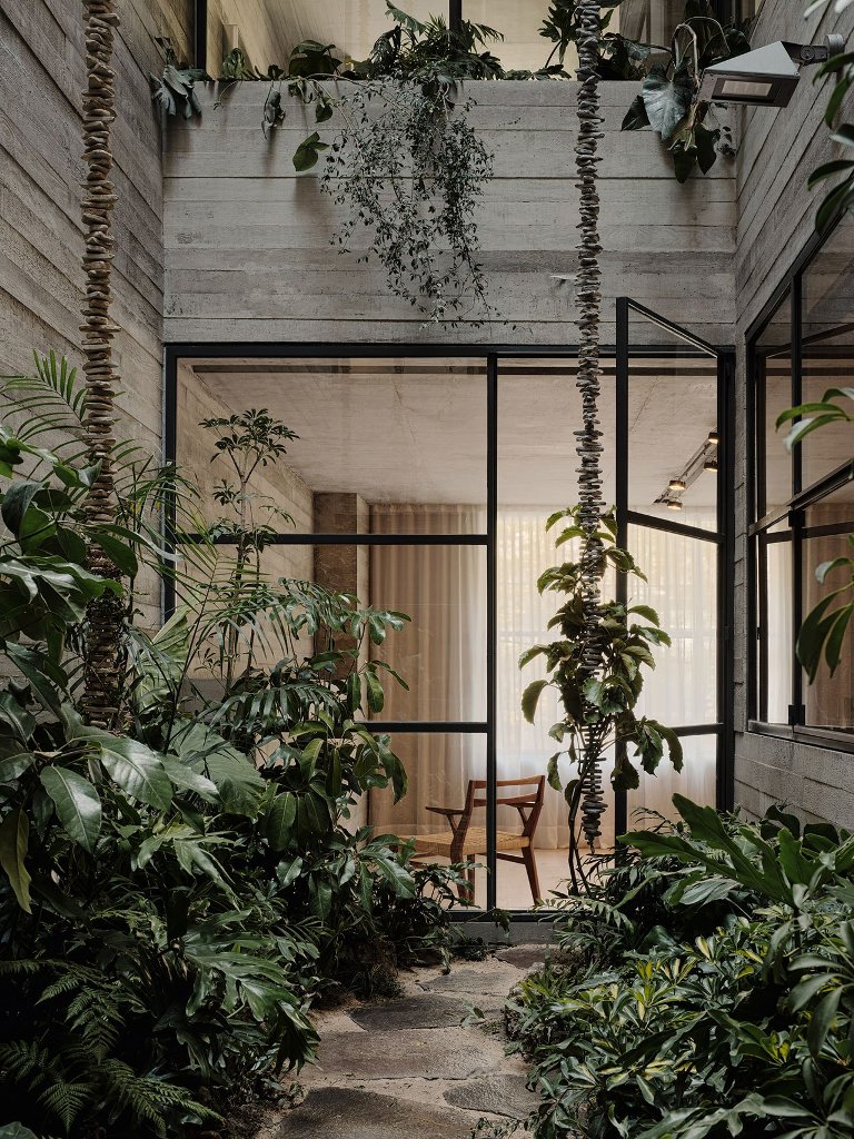 Inner courtyards enliven the indoor spaces with lush plants