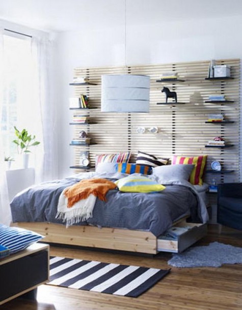 an IKEA Mandal headboard hacked with shelves for open storage is a very practical idea