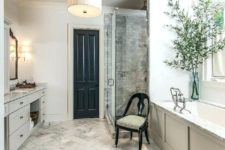 13 a single black door echoing a refined chair make a boring and traditional bathroom refined and catchy