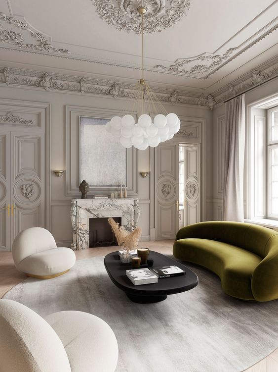 an exquisite room with an olive green curved sofa that adds color and catchy lines to the living room