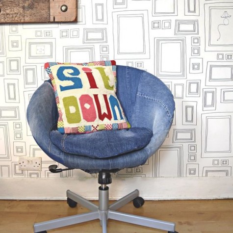 an IKEA Skruvsta chair renovated with some old denim and refreshed with a colorful pillow for a relaxed feel