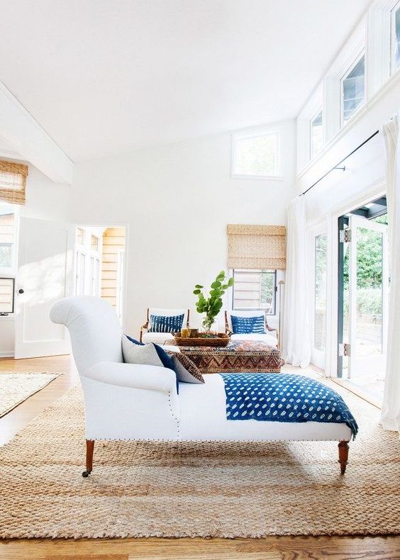 a dreamy Californian space with bold blue linens and touches of natural wood and jute