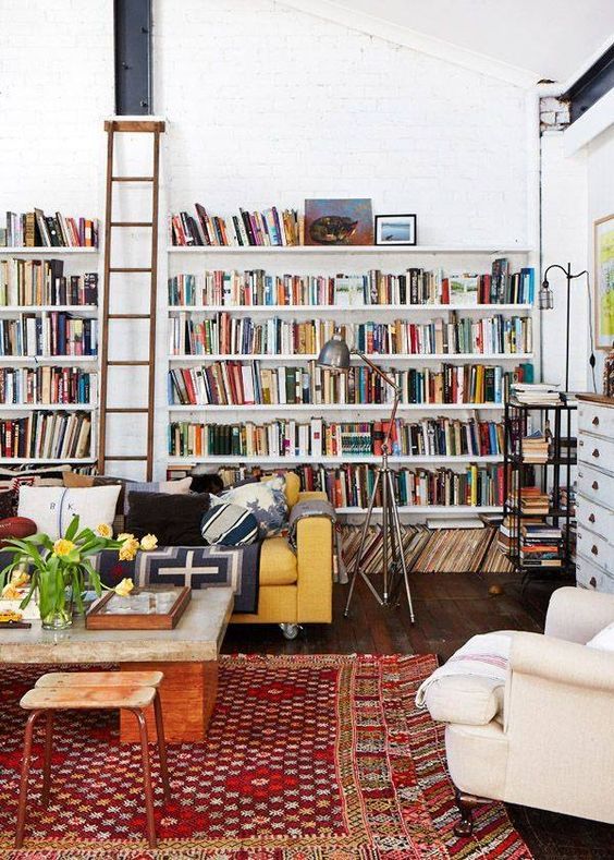 An eclectic Californian home with a boho rug, shabby chic furniture, mid century modern elements