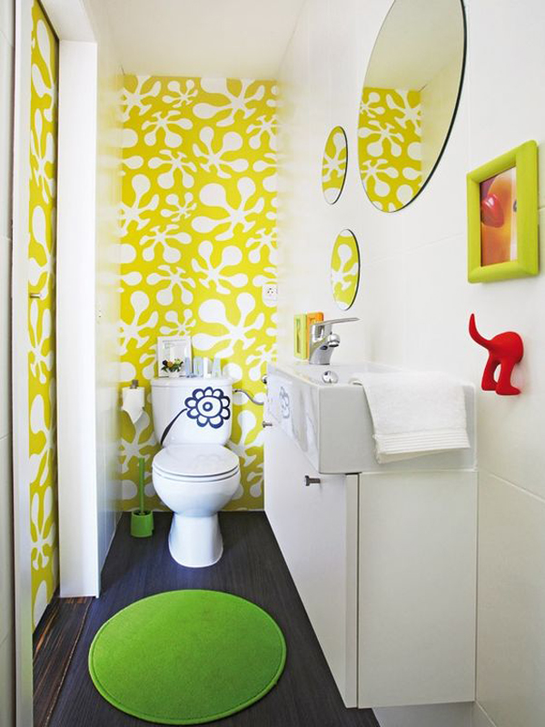 make a kids' bathroom fun with bright and quirky wallpaper, rugs, accessories and shelves on the wall