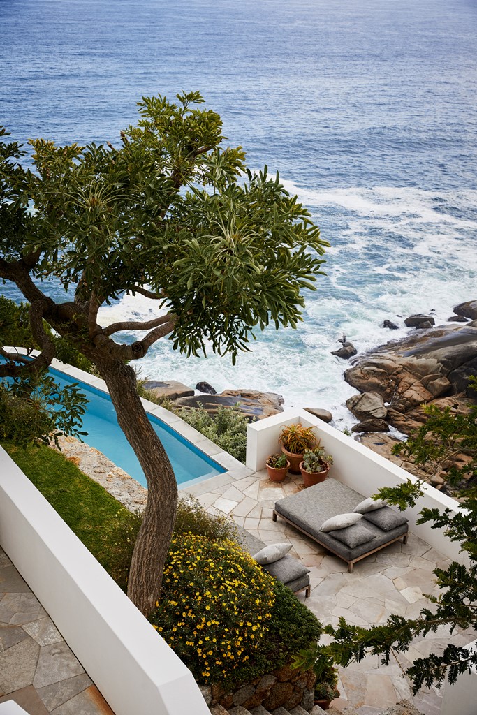 There's a pool, a terrace and gorgeous landscaping around, and the views of the ocean are maximized