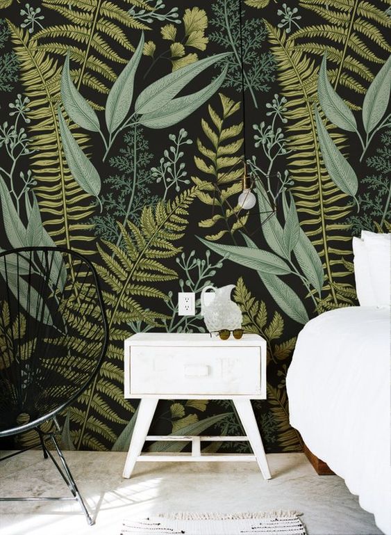 moody botanical print wallpaper contrasting white furniture and decor looks bold and outstanding
