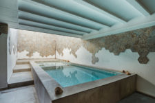 an indoor-outdoor pool design