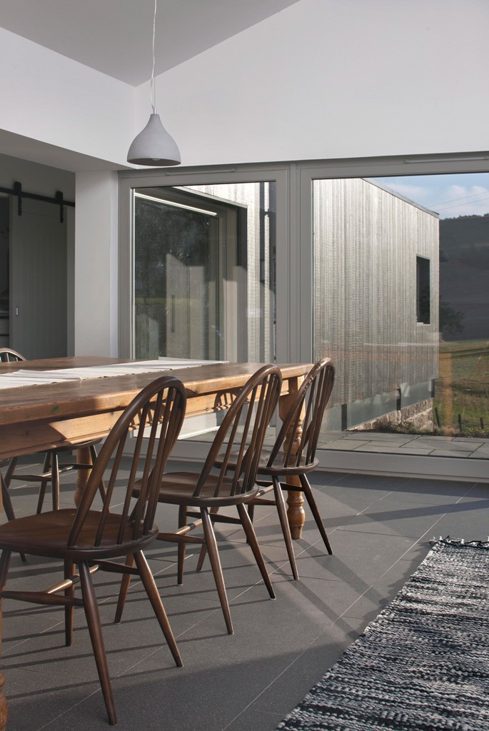 Glazed doors and large windows fill the spaces with light and show off cool sceneries