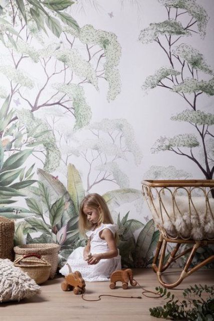 use botanical print wallpaper in the nursery to give it a peaceful and natural feel and match the furniture with this wall