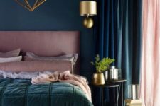 08 a bold bedroom done in teal, dark green and pink, with a gold planter, a wall sconce and a statement chandelier