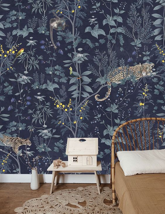 whimsical dark floral and fauna wallpaper for a jungle or tropical-themed nursery or kids' bedroom