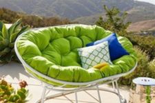 20 a white mamasan chair with a green futon and bright pillows is an amazing item for a modern outdoor space