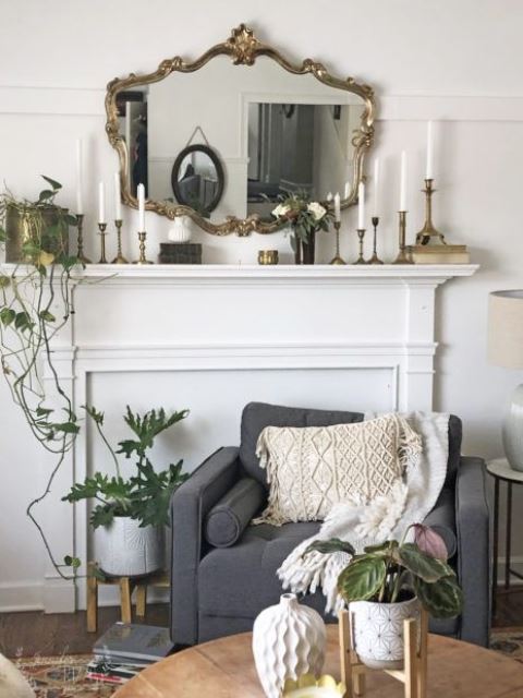 a vintage mirror and matching candleholders raise the living room decor to a new level easily