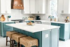 a bright kitchen with white and turquoise cabinets, a white tile backsplash and white countertops, a wooden hood with starfish and beautiful woven stools