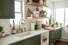 a chic modern meets boho kitchen with olive green shaker cabients, white stone countertops, white subway tiles and open shelves