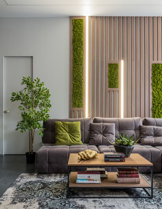 a contemporary biophilic living room with a wooden plank wall with greenery incorporated and some potted plants