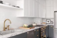 a contemporary kitchen with lower grey cabinets, white upper ones, gold and brass touches, white countertops