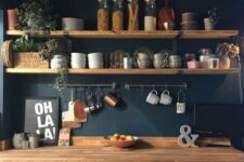 a cozy farmhouse kitchen with a blue backpslash
