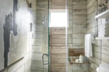 a neutral bathroom done with usual neutral tiles and cool wood plank imitating ones for a soft touch