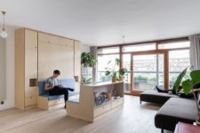01 This small apartment is a nice example of how multi-functional furniture can completely change the space