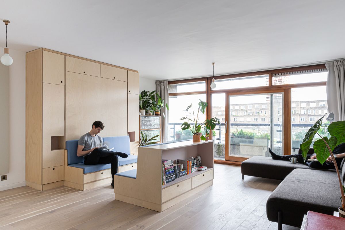 This small apartment is a nice example of how multi functional furniture can completely change the space