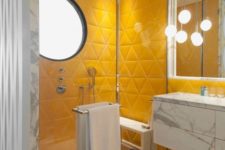 03 a bright bathroom in sunny yellow, with a marble floating vanity, a terrazzo floor and cool pendant lamps