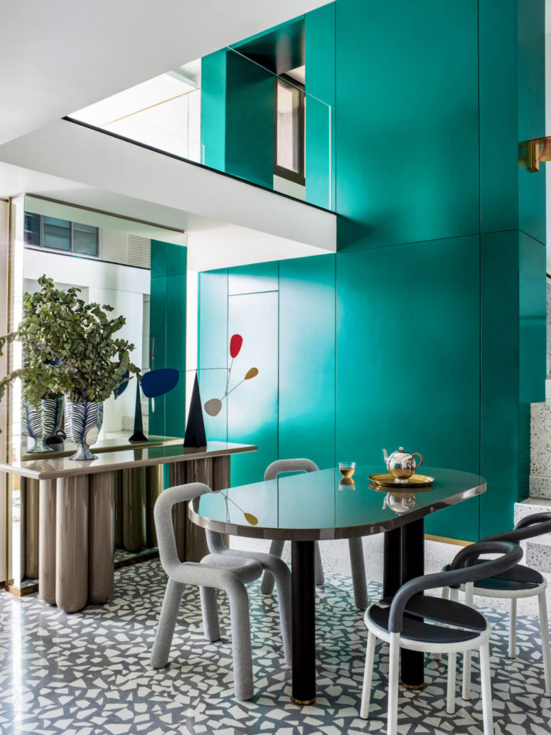 The dining space is innovative due to the pieces that are used to furnish it - these are bold ones