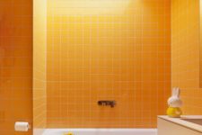04 a bright bathroom done in sunny yellow, with touches of white and a skylight to create a mood