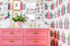 05 the whimsical pineapple wallpaper and bright pink color scheme in this bathroom screams Palm Beach
