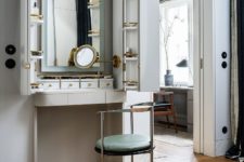 08 There’s a gorgeous and functional makeup nook that can be hidden