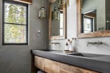 a stylish bathroom with lots of concrete