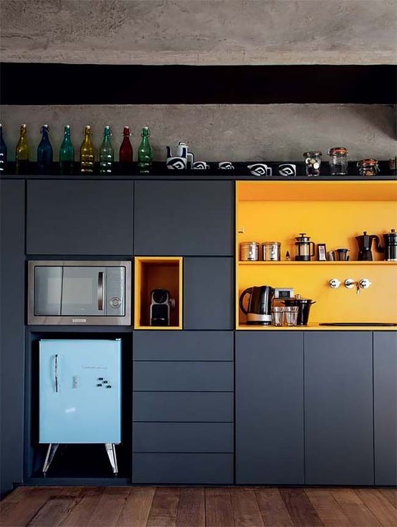 a functional super stylish kitchen design in black and yellow