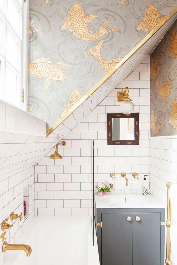 a cute gold-white tiny bathroom design