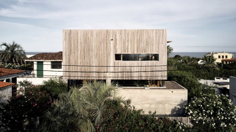 Holiday Home Of Weathered Wood And Concrete