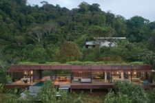 01 This jungle villa features an industrail facade and luxurious interiors plus cool natural views