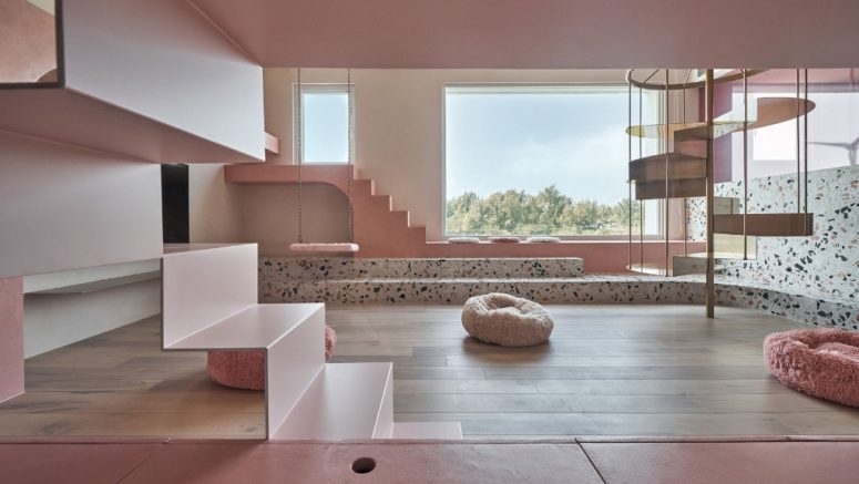 The house is done in contemporary style and features millenial pink and lots of terrazzo for a fun touch