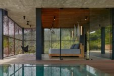 03 The spaces are indoor-outdoor, with a pool and a deck to which the indoor spaces open