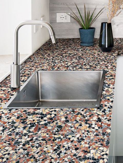such a super bright terrazzo countertop will make any kitchen, even the most neutral one, stand out a lot