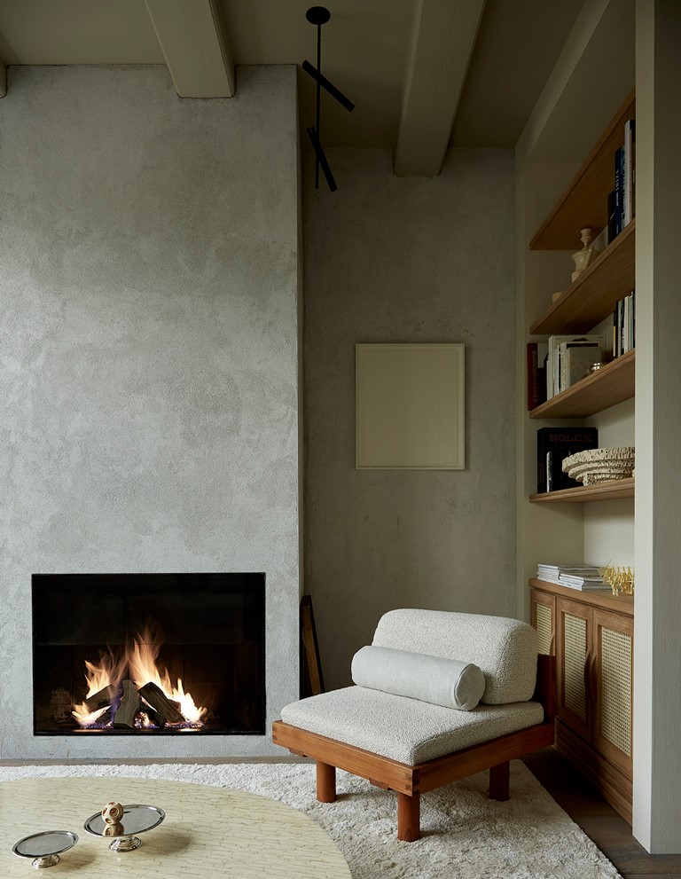 You can also see a built-in fireplace and bult-in shelves for displaying