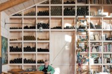 a wall that serves as a wine storage solution