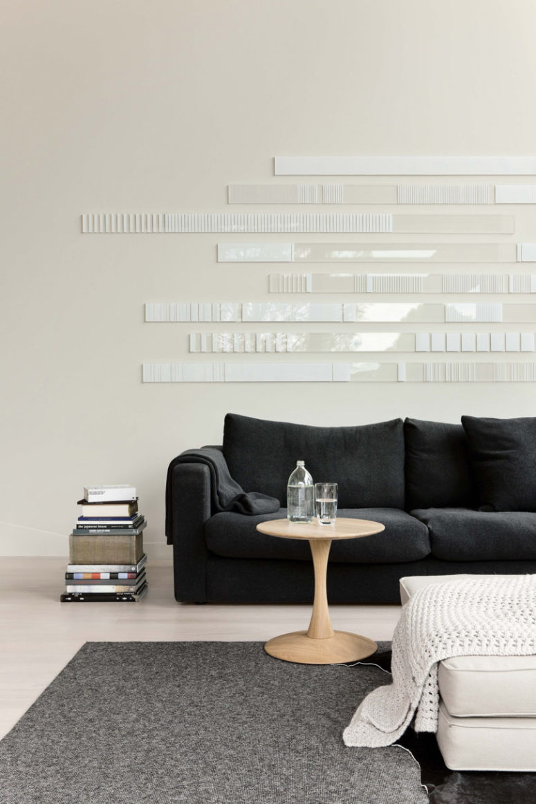 I'm totally in love with this amazing white minimalist wall art created to accent this room
