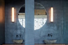 concrete looks great in an industrial bathroom