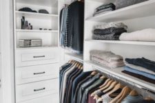 18 a small Nordic closet with open shelves, holders for clothes hangers and some built-in drawers is a cool idea