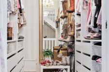 21 a small vintage-inspired sweet closet with a large mirror, a crystal chandelier, open shelves and holders plus drawers