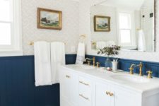 a blue-white bathroom design with bedboard
