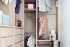a small contemporary closet with built-in units of MDF, with racks and drawers is a lovely idea for any contemporary home